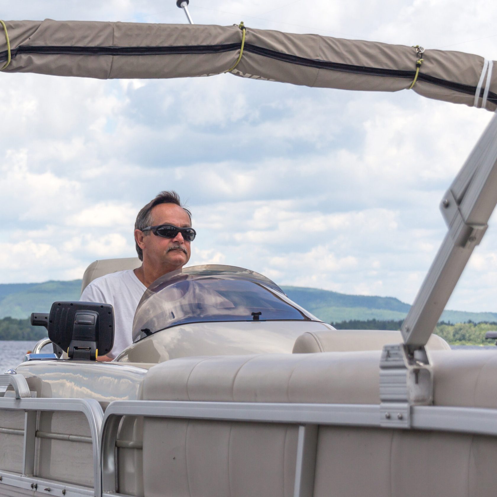 a man sitting on a boat